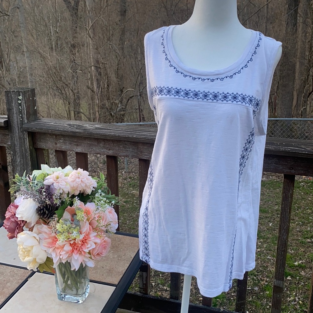 Sleeveless white with blue trim size large shirt